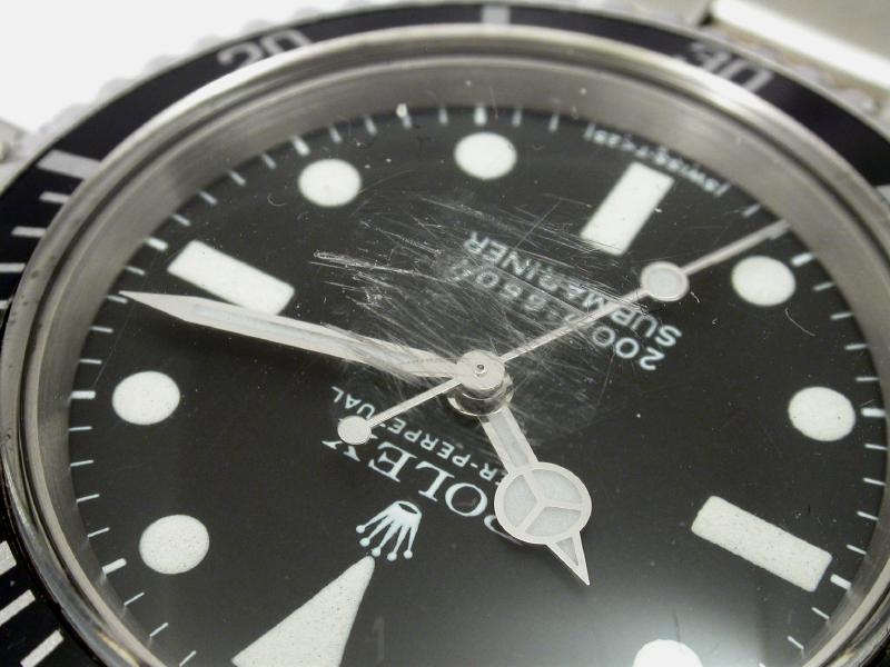 scratched rolex glass